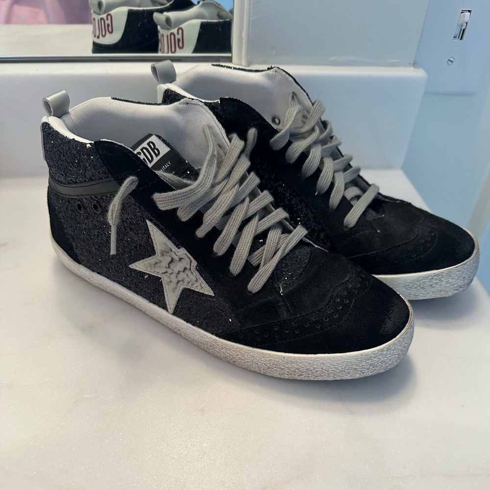 Golden Goose Black and White High-Top Sneakers
